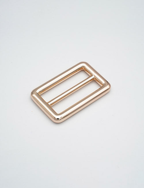 The YIPAI Rings & Slides is a rectangular metallic buckle with rounded edges and a central bar, displayed on a plain white background.