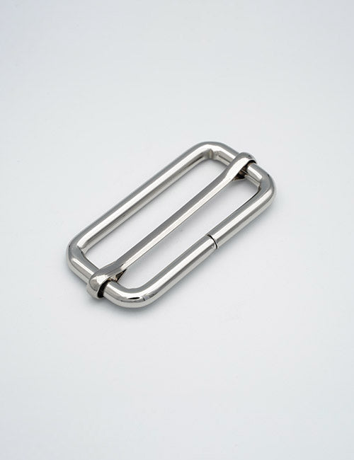 A YIPAI Rings & Slides rectangular silver metal carabiner with rounded edges and a spring-loaded gate is shown on a plain white background.