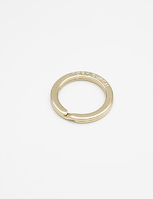 A gold circular key ring from YIPAIs Rings & Slides collection is shown on a plain white background.