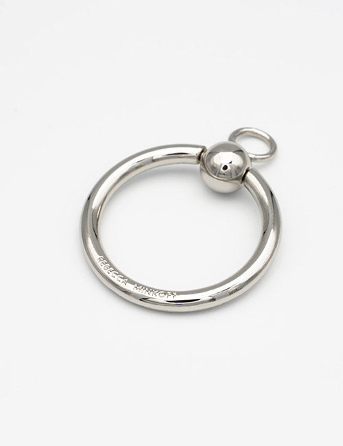 A silver metal key ring from YIPAIs Rings & Slides collection, featuring a round ball clasp and YIPAI engraved on the lower part, displayed against a plain white background.