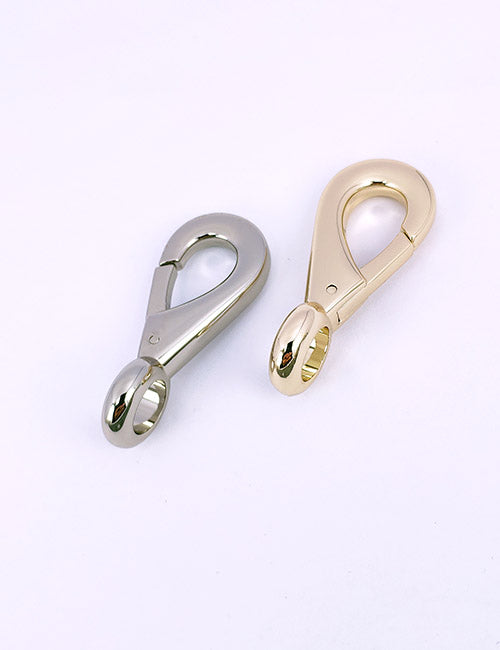 Two YIPAI Snap Hooks, one silver and one gold, are displayed side by side against a plain white background.