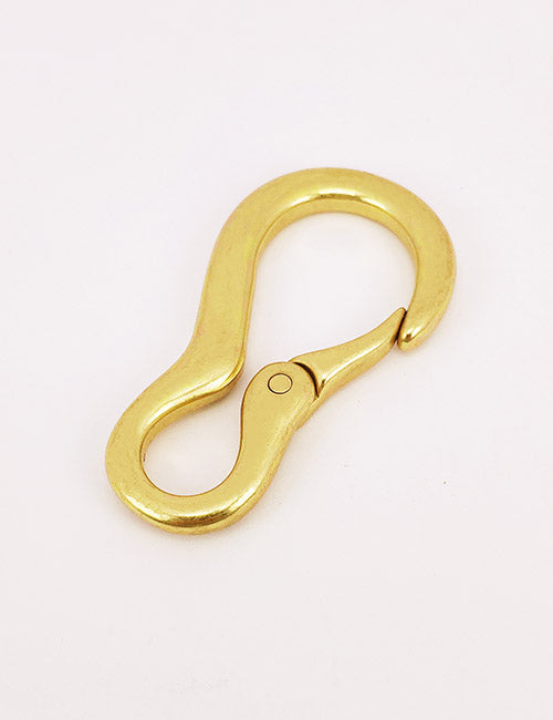 The YIPAI Snap Hook is a gold-colored metal hook with a curved S-shape and hinged clasp, shown on a plain white background.
