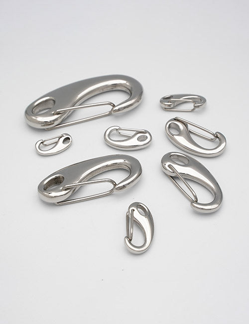 Eight YIPAI Snap Hooks of assorted sizes are arranged on a plain white background.