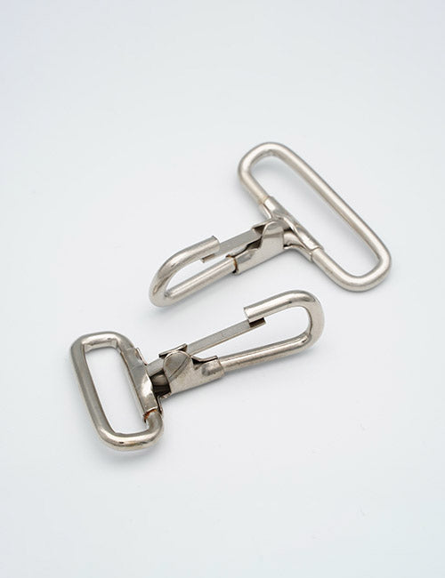 Two YIPAI Snap Hooks with rectangular bases are set on a plain white background. The silver metal hooks are slightly angled and placed parallel to each other.