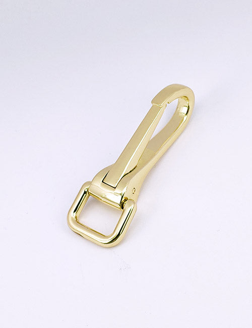 The YIPAI Snap Hook, featuring a gold-tone finish with a rectangular base and spring-loaded clasp, is shown against a plain white background.